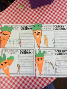 three paper carrots with writing on them sitting on top of a red and white checkered table cloth