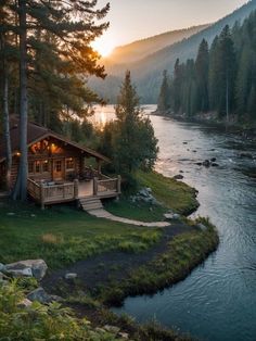 a cabin on the bank of a river at sunset