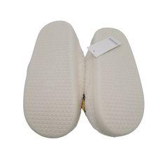 Slip into cozy, warm comfort after a long day of work with our terry cloth slippers. These cute white fuzzy slippers will help you feel all the good vibes and relax (as the happy faces make you and everyone who sees them smile). You’re going to love the playful design of functional slip-on slippers that keep your feet toasty. Pair them with some of our cute loungewear for a chill weekend or spa day! Hand wash warm; hang to dry S/M fits sizes 6-7, M/L fits sizes 8-9 We designed our happy face sli White Casual Slippers With Soft Texture, Casual White Slippers With Soft Texture, Casual White Slippers For Relaxation, Comfortable Plush Lined Slippers For Loungewear, Comfy Super Soft Slippers For Leisure, White Cushioned Slippers For Leisure, Comfy White Slippers With Textured Footbed, White Super Soft Slippers For Loungewear, Comfortable White Slippers For Loungewear