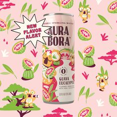 a can of aura bora on a pink background with dragon fruit and flowers in the background