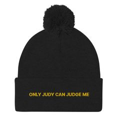 A warm and cozy beanie with "Only Judy can judge me", expertly embroidered on the front. This funny winter hat is the perfect pom pom beanie for everyday. Designed by Nina and made just for you! This hat is customizable! Just add your custom text and create your new favorite beanie, right here with us! Looking for something more personalized? Shoot us a message! * 100% acrylic * Fold-over 3″ (7.6 cm) cuff * Pom-pom on top * One size fits most - See size guide * Actual color may be slightly different from the image due to different monitor and light effects Visit our website for deals and more designs! www.ninasfunkyshop.com Thanks for visiting Nina's Funky Shop by Ninanush! We create funny, weird and eye-catching designs that are original, unique, and made just for you! All of our products Cotton Beanie Cap With Letter Print, Cotton Beanie With Letter Print, Winter Cotton Hats With Letter Print, Letter Print Beanie Hat One Size Fits Most, Winter Beanie With Letter Print, Cotton Beanie Hat With Letter Print, Winter Cotton Beanie With Embroidered Logo, Winter Embroidered Cotton Hat, Embroidered Beanie Cap, One Size Fits Most