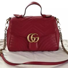 Gucci Matelasse Leather Gg Marmont Top Handle Small Shoulder Bag With Coa Certification Of Authenticity Comes With Original Dust Bag And Cards Full Detail Coa Will Be Provided To The Buyers. Currently Has Personal Information Excellent Condition Only Worn Twice This Gucci Gg Marmont Width (At Base): 10" Height: 7" Depth: 4" Handle Drop: 3" Shoulder Strap Drop: 19.5" Product Details Type Of Material: Leather Color: Hibiscus Red Lining: Beige Microfiber Pockets: Two Interior Hardware: Antique Gold Interior Hardware, Hibiscus Red, Base 10, Gucci Gg Marmont, Gg Marmont, Original Card, Small Shoulder Bag, Gucci Bag, Antique Gold