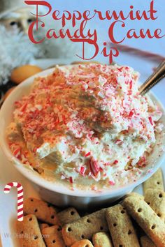 peppermint candy cane dip in a white bowl with crackers on the side