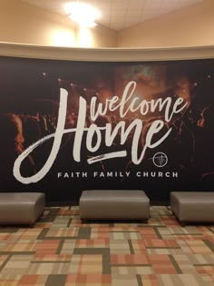 a large welcome sign in front of a wall with the words,'welcome home faith family church '