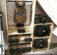 the gym equipment is neatly organized and ready to be put into use in the home