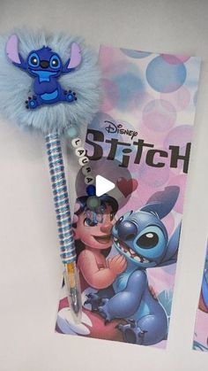 the stitch book and pen are next to each other