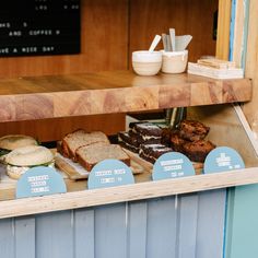 an assortment of breads and pastries on display