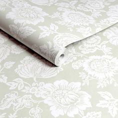 an image of a wallpaper with white flowers on the background and light green paper