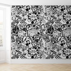 black and white graffiti wallpaper in an empty room