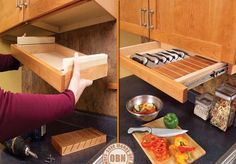 a woman is opening the drawer in her kitchen and cooking food on the stove top