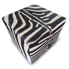 a black and white zebra print ottoman