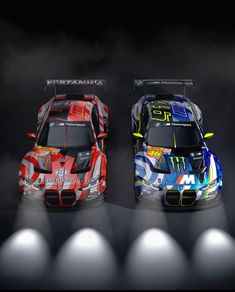 two cars are shown side by side in front of some spotlights on a black background