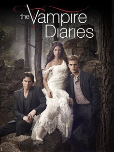 the vampire's daughter is standing next to two men in front of some trees