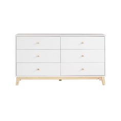 a white dresser with wooden legs and drawers