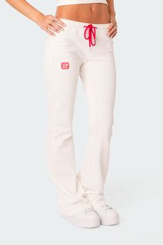 PRODUCT INFO Sweatpants Flared leg Adjustable tie waist Embroidered logo Matching set Cotton, Spandex Model wears size S Model height is 5'6 Item care: Wash with similar color Flared Sweatpants, Outfit Pieces, Best Amazon Buys, Buy List, Chill Fits, School Clothes, Fashionista Clothes, Swimwear Dress, Clothing Stores