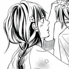 two girls with long hair and ponytails are looking into each other's eyes