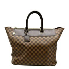 Item Details: Designer: LOUIS VUITTON Series: Greenwich PM Style: Travel Tote Bag Material: Damier Ebene with leather Color: Brown Made: France Date Code: AR0095 Made Year: 2005 Measurements: W 15' H 13" D 9.25" Accessories: No Accessories. Condition Detail: Excellent - The Item is in excellent condition with minimal signs of use. Outside: Clean condition. Inside: Light dirt, light signs of use. Edges: Light rubbing, light signs of use. Leather: Light dirt marks, light signs of use. Hardware: Li Pre-owned Monogram Canvas Business Bag, Designer Pre-owned Travel Bags, Pre-owned Rectangular Brown Bag, Pre-owned Brown Bag With Double Handle, Pre-owned Rectangular Business Bags, Pre-owned Business Bags, Pre-owned Monogram Canvas Travel Bag, Tory Burch Robinson Tote, Tory Burch Ella Tote