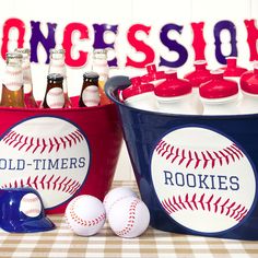 two buckets filled with beer and baseball balls on top of a checkered tablecloth