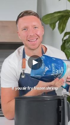 a man in an apron is pouring water into a pot with the words if you air fry frozen shrimp