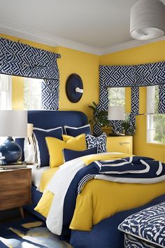 Refresh your bedroom with the vibrant duo of navy blue and yellow. From bold walls to subtle accents, find inspiration to rejuvenate your space. Navy Blue And Yellow, Navy Accents, Blue And Yellow, Modern Bedroom, Bedroom Ideas