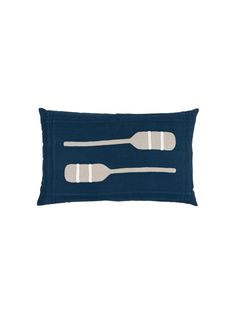 two forks and spoons on a blue pillow with white piping in the middle