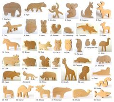 the wooden toy animals are all different shapes and sizes