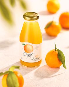 an orange juice bottle sitting on top of a table