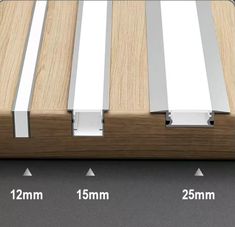 an image of a wooden slatted window seal with two different sizes and widths