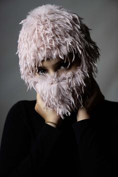 This pink mask features a soft and plush texture, making it both comfortable and stylish. The fringe cord details add movement and a unique touch, while the open eye and nose sections ensure easy breathing and visibility. Designed to elevate your everyday look, this mask is perfect for nightclubs, festivals, and parties, helping you stand out in any crowd. Additionally, it serves as a functional accessory for cold weather or outdoor events, blending style and practicality effortlessly. Fluffy Fringe, Motorcycle Mask, Custom Mask, Pink Mask, Unique Faces, Fashion Mask, Ski Mask, Functional Accessories, Outdoor Events