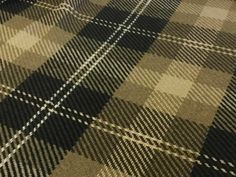 a close up view of a black and white checkered fabric