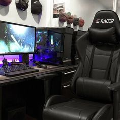 a gaming chair sitting in front of a computer monitor on top of a wooden desk