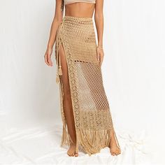 Season:Summer; Fabric:Spandex; Dress Length:Maxi; Gender:Women's; Style:Fashion,Casual,Beach Wear; Occasion:Beach,Vacation; Fit Type:Regular Fit; Waistline:High Waist; Pattern:Solid Colored; Design:Cut Out,Crochet; Pants Type:Swimwear,Skirt; Front page:FF; Listing Date:01/17/2024; Production mode:External procurement; Length:; Waist: Stretch Mini Skirt For Beach Season, Bohemian High Waist Skirt For Beach, Bohemian Stretch Skirt For Vacation, Bohemian Beige Mini Skirt For Beach, Beach Bohemian Beige Mini Skirt, High Waist Beach Skirt, Beachwear Mini Skirt For Beach Cover-up, High Waist Skirt For Beach Season Vacation, High Waist Mini Skirt For Beach