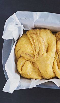 a loaf of bread wrapped in wax paper