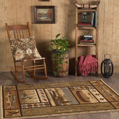 a bear rug is on the floor next to a rocking chair and bookshelf