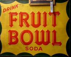 a sign that says drink fruit bowl soda