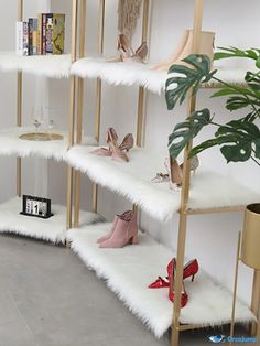 shelving unit with white fur and gold legs