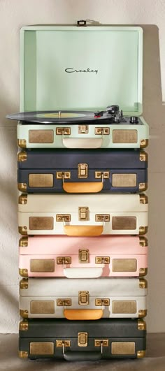 a stack of suitcases stacked on top of each other