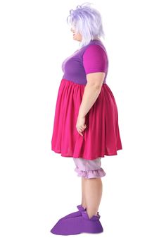 a woman in purple and pink is standing with her back to the camera while wearing purple shoes