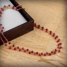 It is said that wearing Ruby (Manikya) Rosary brings power, reputation and dignity. Ruby helps the wearer get support from government, state, authority or theadmin. One of the noticeable effects of Ruby Gemstone Mala is that it clears the mind and makes it active. red ruby rosary necklace,gold plated necklace,beaded chain necklace,Tiny beads necklace,wire wrapped necklace,Everyday minimalist jewelry,mom,wife gift,Tiny beads necklace,red jewelry,Unique Gift for her,gemstone necklace, Gemstone -ru Gift Double Strand Beaded Crystal Necklaces, Gold Lariat Beaded Necklace With Gemstone, Gold Gemstone Beaded Lariat Necklace, Gift Double Strand Beaded Crystal Necklace, Double Strand Beaded Chain Crystal Necklace As A Gift, Double Strand Beaded Crystal Necklace As A Gift, Handmade Ruby Spiritual Jewelry, Gift Crystal Necklaces With Delicate Chain And Round Beads, Handmade Spiritual Ruby Jewelry