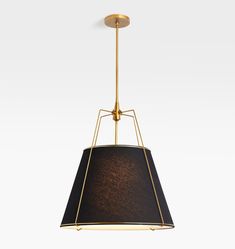 a light fixture with a black shade on the bottom and gold trimmings, hanging from