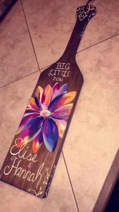 a wine bottle shaped like a flower on the floor