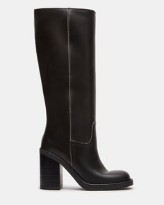 Elevate your style with the WESTLEY boot. With a versatile knee-high design and comfortable block heel, these boots will keep you looking chic and feeling confident all day long. Perfect for any occasion, these are a must-have addition to your shoe collection. 3.75 inch heel height 15 inch shaft circumference 13.25 inch shaft height Leather upper material Synthetic lining Synthetic sock Synthetic sole Fit tip: If you are in between sizes, size up a half-size Imported Tall Black Heeled Boots, Black Tall Boots, Platform Knee High Boots, Black Leather Knee High Boots, High Design, Black Boots Tall, Feeling Confident, Black Heel Boots, Tall Boots