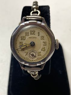 "Here's an absolutely beautiful and super rare Novoris mechanical wind watch. I looked up the movement, it is the Nororis cal 260. It was made in the 1940s. The watch is in really good shape and original for the age. It is an extremely strong runner as well. The bracelet may be original to the watch and it is period correct. It will start to expand at 7\" and could easily fit an 8\" wrist. If it's not your style, it could be easily changed. Also the bracelet is abit loose Please message me with Kids Rings, Silver Gifts, Swiss Watches, Stainless Steel Material, Stretch Bracelets, Silver Bracelets, Womens Watches, Etsy Vintage, Beautiful Rings