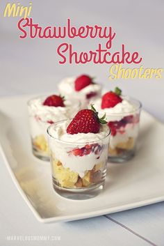 mini strawberry shortcake shooters on a white plate