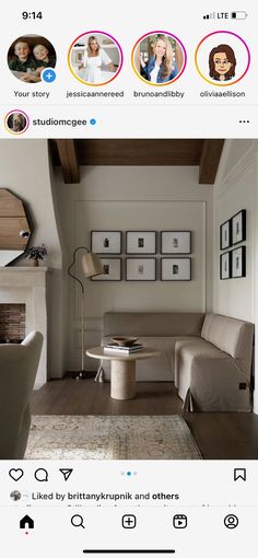 a living room filled with furniture next to a fire place and pictures on the wall