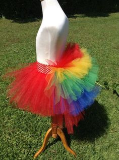 a mannequin wearing a multicolored tutu skirt