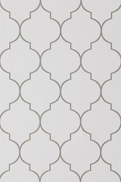 a white and grey wallpaper with an intricate design on it's side,