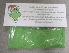 a green bag with a grino face on it and a poem written in the front