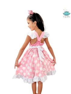 Minnie Mouse, The Charming Classic Minnie Mouse, known for her charm, and cheerful personality, brings a bit of sparkle to every adventure. Every kid with a charming personality and love for style would love to get into a Minnie dress up. Introducing our cartoon-inspired Pink Miss Mouse Polka Dot Dress. Cartoon Dress for Kids and Toddlers This dress features: A soft pink bodice with white polka dots, inspired by Minnie’s iconic look. Ruffled white hemline for added charm and a touch of vintage e Birthday Dress Theme, Polka Dot Dress For Kids, Classic Minnie Mouse, Cartoon Dress, Dress Cartoon, Charming Personality, Minnie Dress, Dress For Kids, Dot Dress