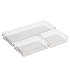 two clear plastic trays with dividers